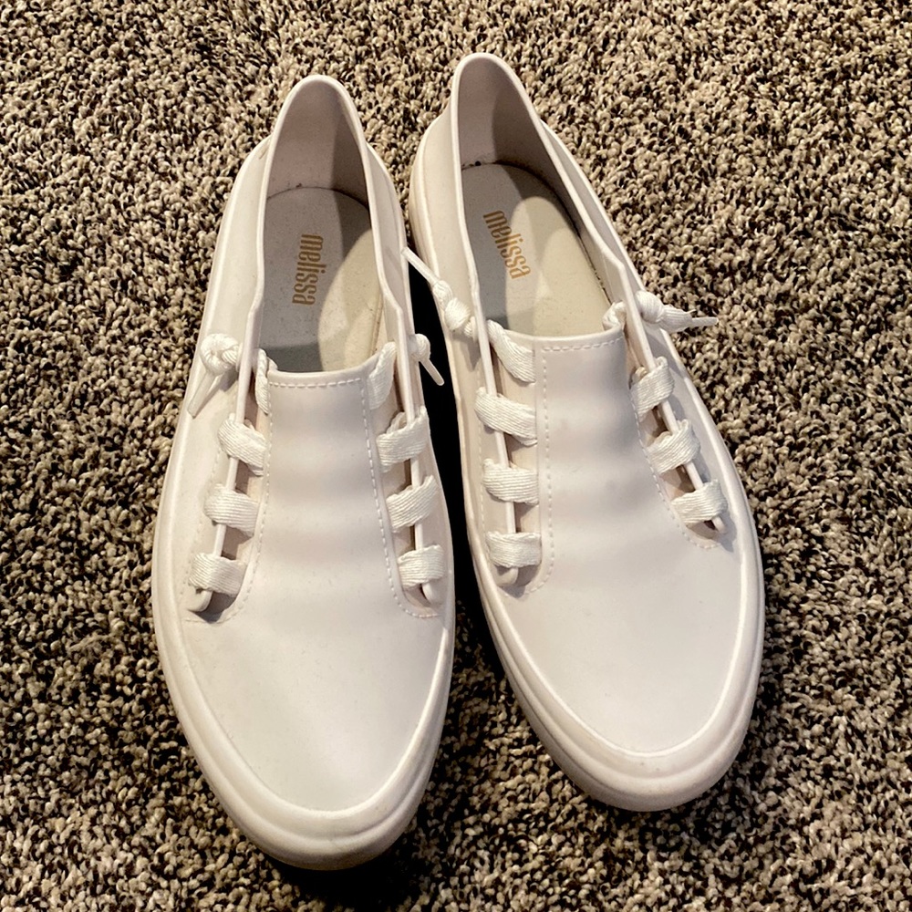 100% real plastic shoes but very comfy!